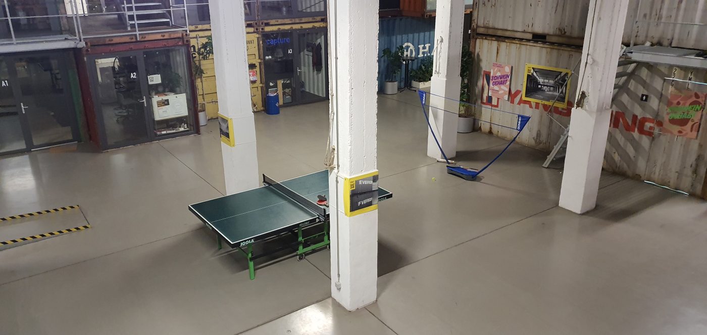 a ping pong table in a room