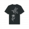 a black shirt with a bee and flower